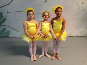 Maggie (center) with her friends Caitlyn and Kennedy, who helped her ballet when she couldn't see. 