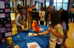 Our troop was the UK for thinking day this year. This pic wzs taken at our display table with one of our girls stamping the passport of a traveler.