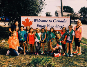 Scouts are International Travelers. Troop in front of the Welcome to Canada sign