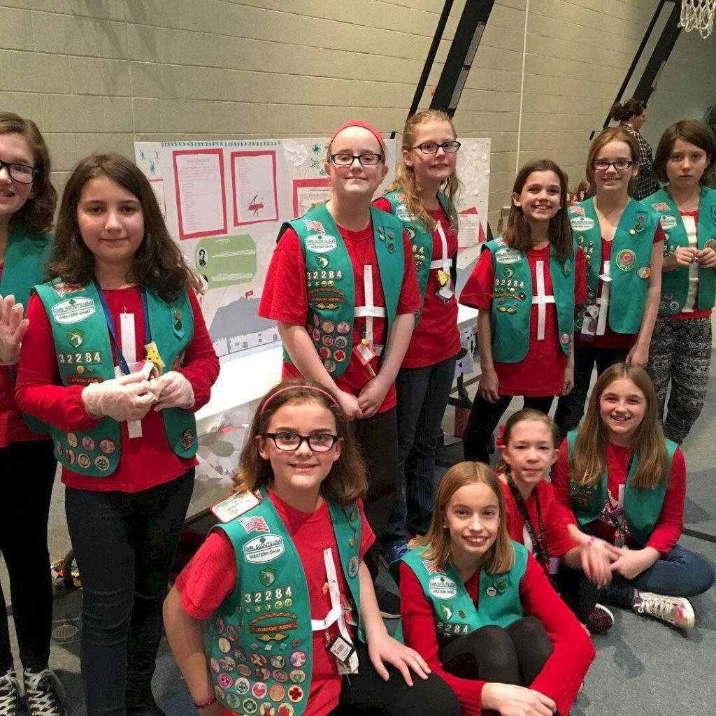 Junior Girl Scouts Represent Switzerland for Thinking Day.