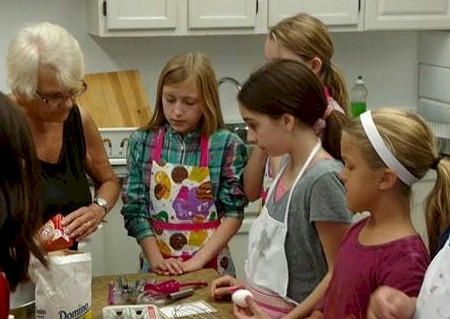 Cadette Girl Scouts Baking Italian Cookies