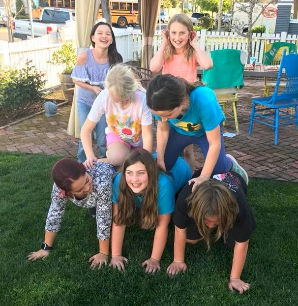Junior Girl Scout Troop earning a cheer patch.