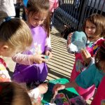 Daisy Girl Scouts Making Bird Feeders from Recycled Materials.