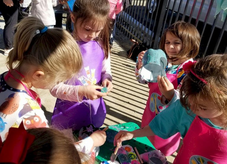 Daisy Girl Scouts Making Bird Feeders from Recycled Materials.