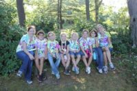 Girl Scouts take a break during their camping trip.