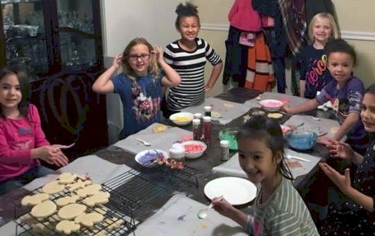 Daisy Girl Scouts Bake Holiday Cookies