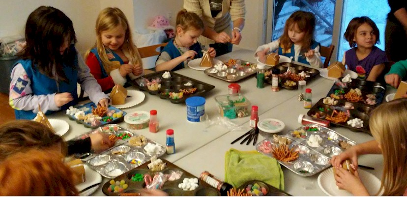 Daisy Girl Scouts Making Gingerbread Houses