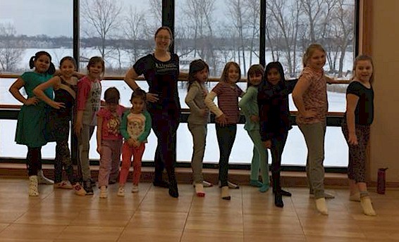 Brownie Girl Scout learning ballet,
