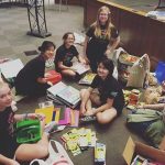 Girl Scouts doing a school supply drive.