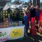 Girl Scout Cadettes Supehero Cookie Booth