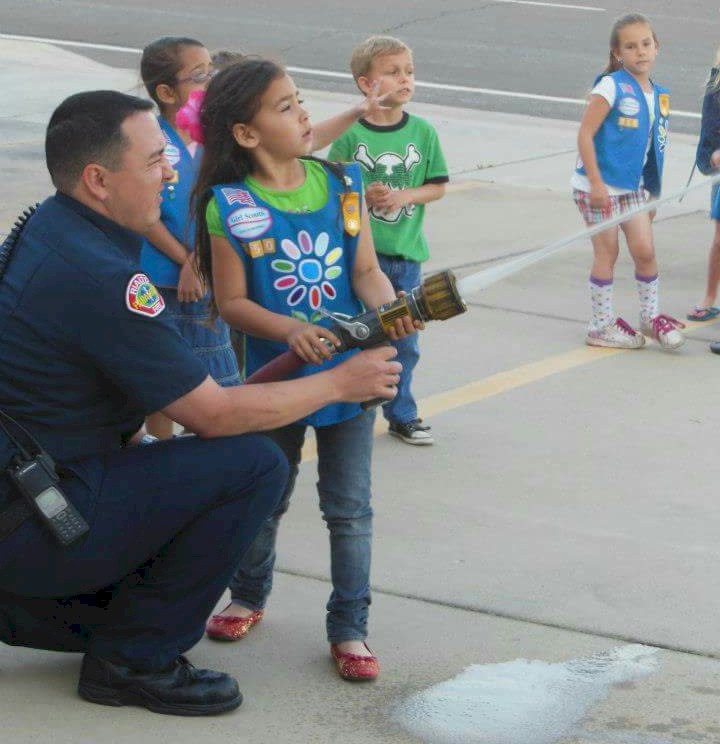 Daisy Girl Scout with Fire House