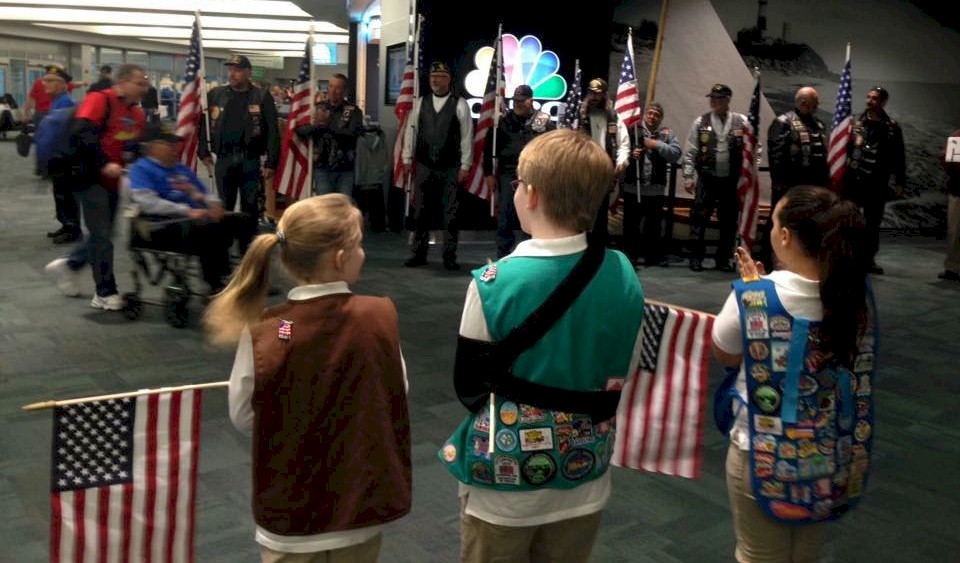 Girl Scouts attend an Honor Flight.
