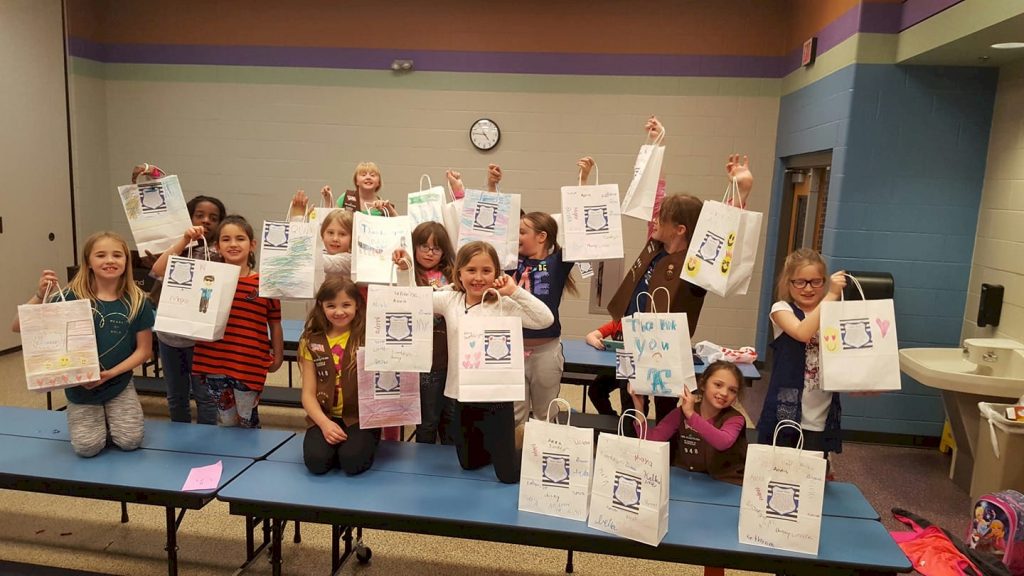 Brownie Girl Scouts respect authority.