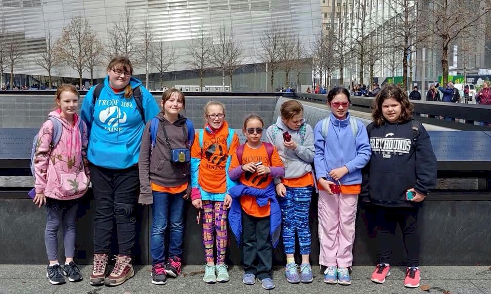 Junior Girl Scout visiting the 911 Memorial in New York City.