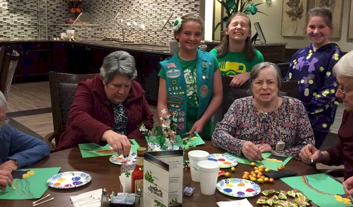 juniors-painting-with-seniors Junior Troop painting with assited living residents.