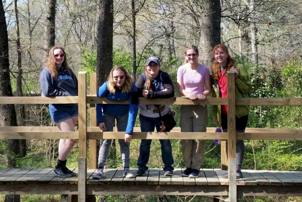 Senior Girl Scouts earning the retired Forestry IP.