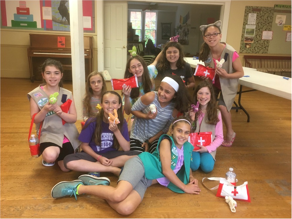 Girl Scout Cadettes completing First Aid Badge in a Bag from MakingFriends.com