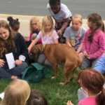Brownie Girl Scouts with Rescue Dog