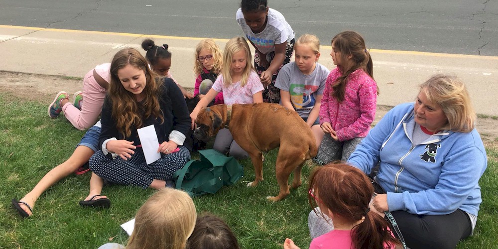 Brownie Girl Scouts with Rescue Dog