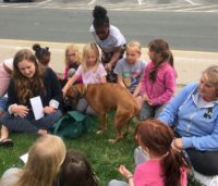 Brownie Girl Scouts with Rescue Dog