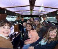 Girl Scouts in a Limousine