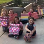 Junior Girl Scouts earning their Girl Scout Ways Badge