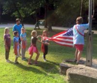 Junior Troop 14661 - Flag raising at Singing Hills.