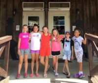 Junior Girl Scout Troop at a ranch.