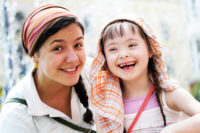 Happy family moments - Mother and child have a fun Special Needs Advocates