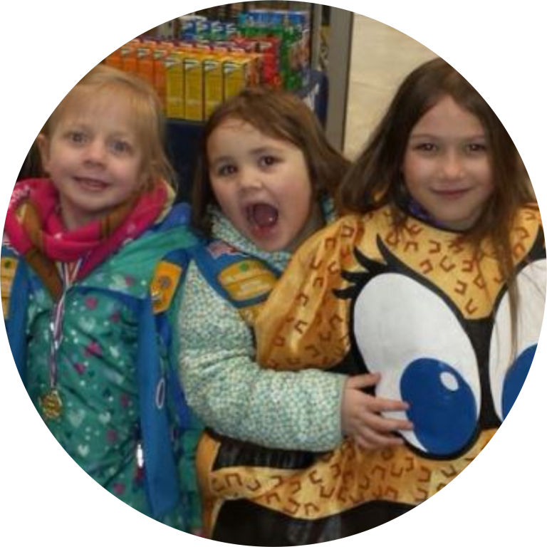 Girl Scouts at a Cookie Booth