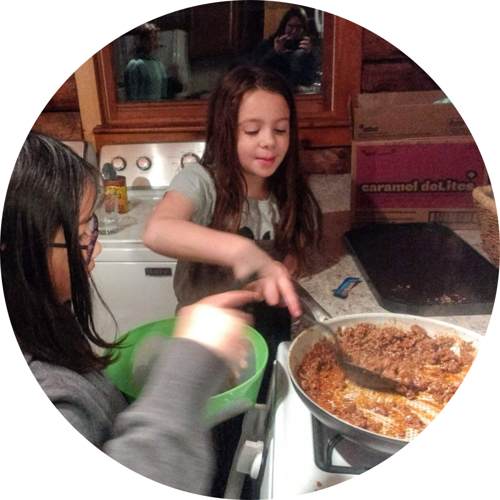 Girl Scouts Cooking at Camp